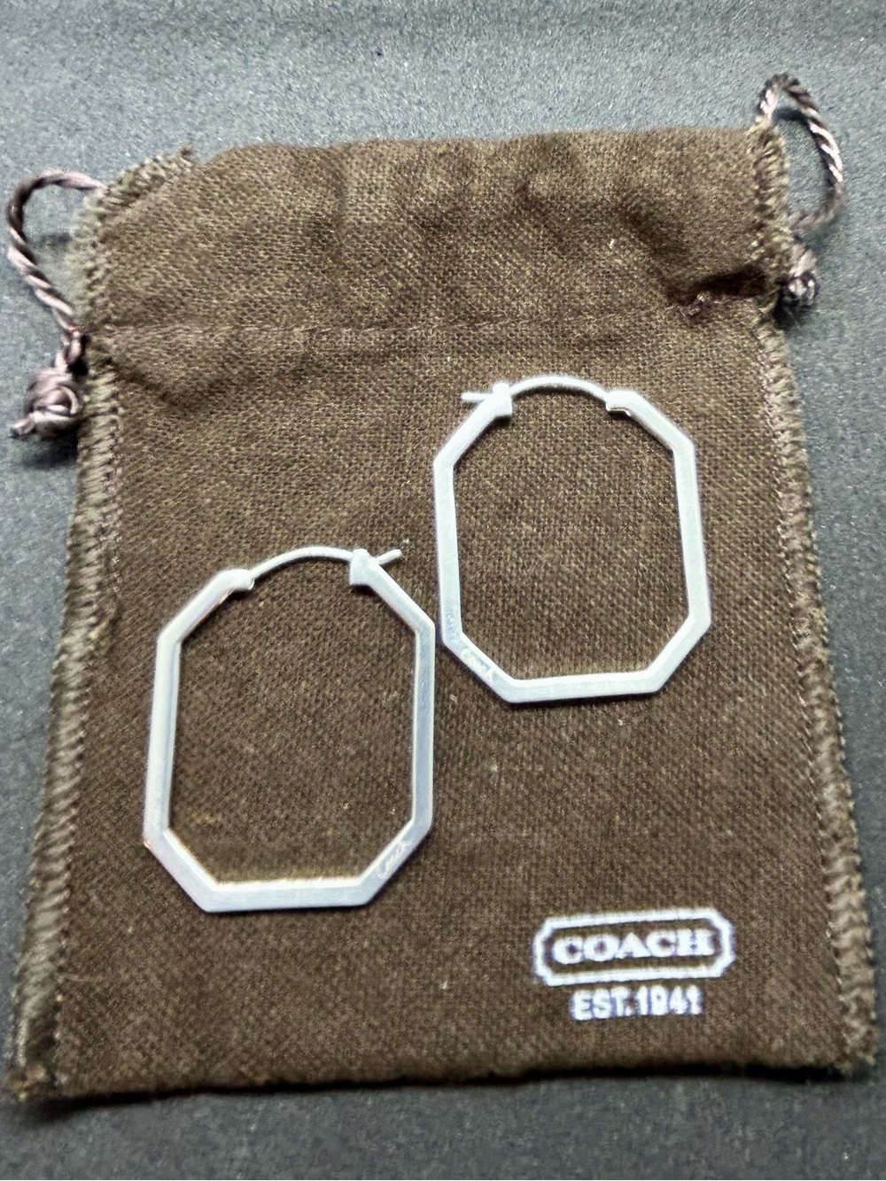 Coach Sterling Silver Octagonal Hoop Earrings with engraved logo.